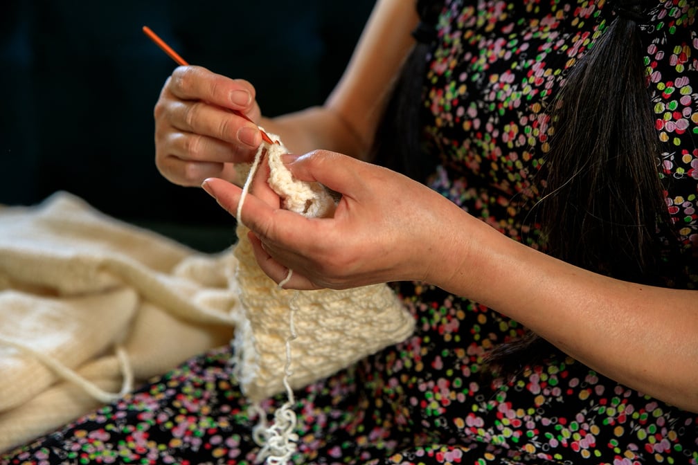 Close Up of Hands while Crocheting